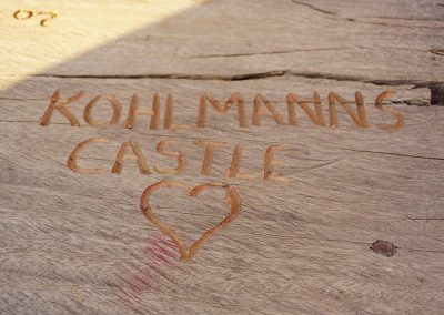 Kohlmann's Castle verewigt in der Pelican Bar